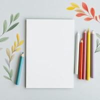 Coloring book page mockup with crayons photo