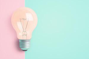 Light bulb on pastel blue and pink background with copy space. Idea stock photography. Informative slide photo