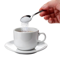 cup of coffee with a spoon. a cup of coffee with sugar being poured into it. png