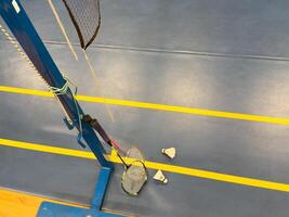 Racket and Shuttlecock with use sport or exercise on a black background. photo