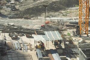 workers are working on large construction sites and many cranes are working in the, Industry new building business. photo