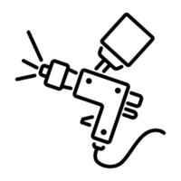 A linear icon of an airbrush machine spraying paint. vector