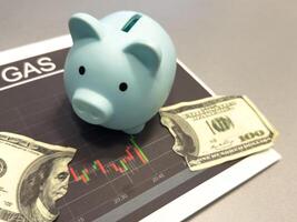 Piggy bank investment with a graph of investment returns in the background. Concept for financial security and savings. photo