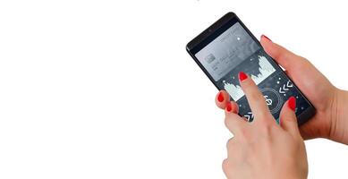 Making a mobile payment via a smartphone with frameless design. photo