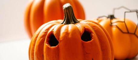 Close Up of a Jack-o'-lantern with Two Eyes Carved Out photo