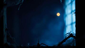 silhouettes spiders crawling on a window pane with a full moon photo