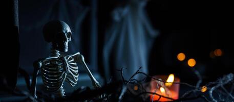 plastic skeleton model creates a spooky atmosphere a dark setting photo