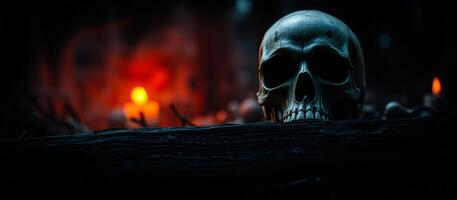 human skull rests on a weathered log with burning flames the background photo