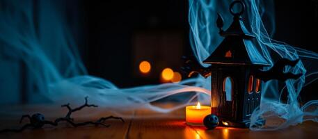 black lantern with a lit candle photo