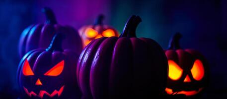 illuminated carved pumpkins cast an eerie glow photo