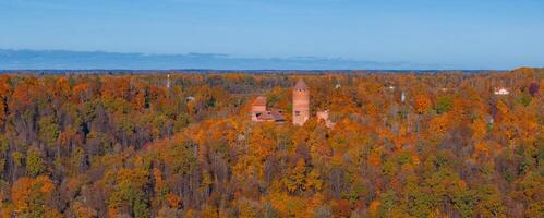 Aerial View of Turaida Castle Amidst Sigulda's Golden Autumn Foliage photo