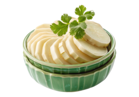 A bowl of sliced potatoes with parsley on top png