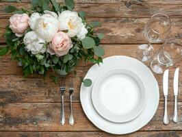 elegant table setting with flowers and glassware photo