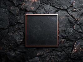 dark slate rock background with empty frame photo