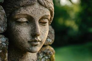 Serene stone buddha statue in nature photo