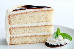 Delicious layered cake with creamy frosting and chocolate drizzle photo
