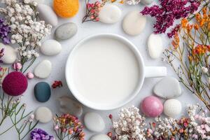 Colorful Easter eggs and spring flowers on a white background photo