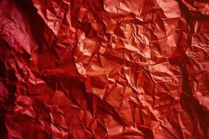 Crumpled red paper texture background photo