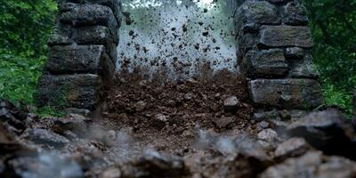 muddy water splashing through rocks photo