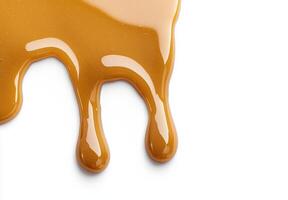 Dripping honey or caramel sauce photo
