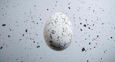 Cracked and weathered egg shaped object surrounded by debris photo