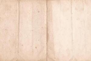 Folded Vintage Paper Sheet. Brown crumpled and folded parchment paper texture with space for text vector
