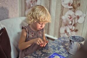 Young Girl Making Homemade Dumplings in Kitchen photo