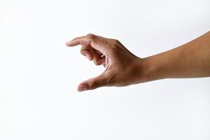 A man's hand is taking something on a white background photo