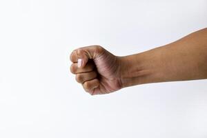 The hand pose of a man hitting vigorously on a white background photo