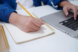 Teenage using tablet for communication, search data internet website to learn. photo