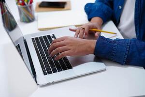 Teenage using tablet for communication, search data internet website to learn. photo