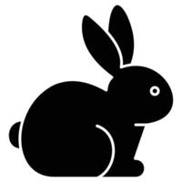 A black and white silhouette of a rabbit vector