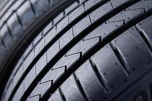 Close up on new summer tire with tread pattern photo