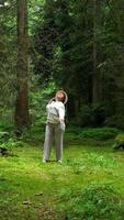 A Person Truly Enjoying the Wonders of Nature While in a Beautiful, Serene Forest Setting video
