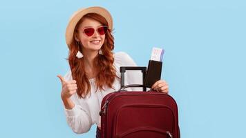 I Like Travel. Girl Posing With Suitcase Holding Tickets And Passport Gesturing Thumbs Up Over Pink Studio Background. Panorama photo