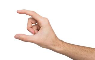 Male hand measuring invisible items, man's palm making gesture while showing small amount of something on white isolated background, side view, close-up, cutout, copy space photo