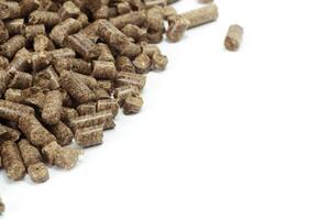 stack of wooden pellets for bio energy, white background, isolated photo