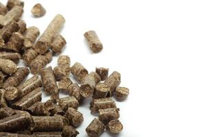 stack of wooden pellets for bio energy, white background, isolated photo