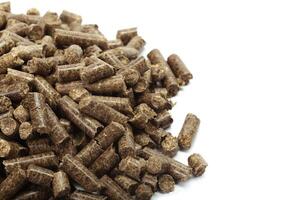 stack of wooden pellets for bio energy, white background, isolated photo