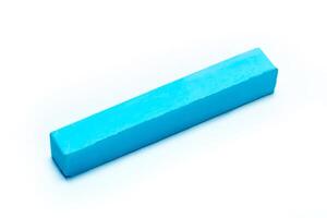 chalks in a variety of colors arranged on a white background photo