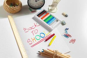 text back to school with open page notebook photo
