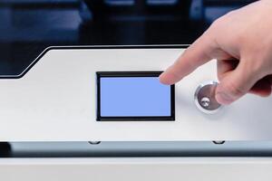 Designer Working With 3D Printer photo