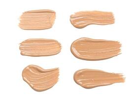 smeared foundation natural make up on white background photo