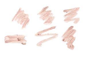 smeared foundation natural make up on white background photo