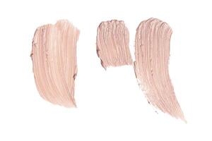 smeared foundation natural make up on white background photo