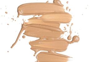 smeared foundation natural make up on white background photo