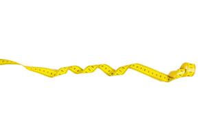 yellow metric measuring tape isolated on white panorama background photo