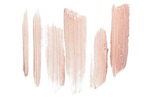 smeared foundation natural make up on white background photo