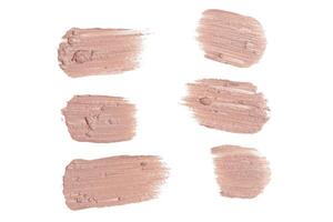 smeared foundation natural make up on white background photo