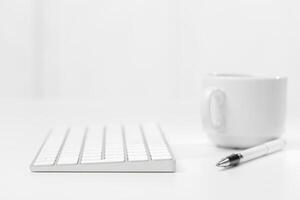 Office desk table with computer keyboard photo